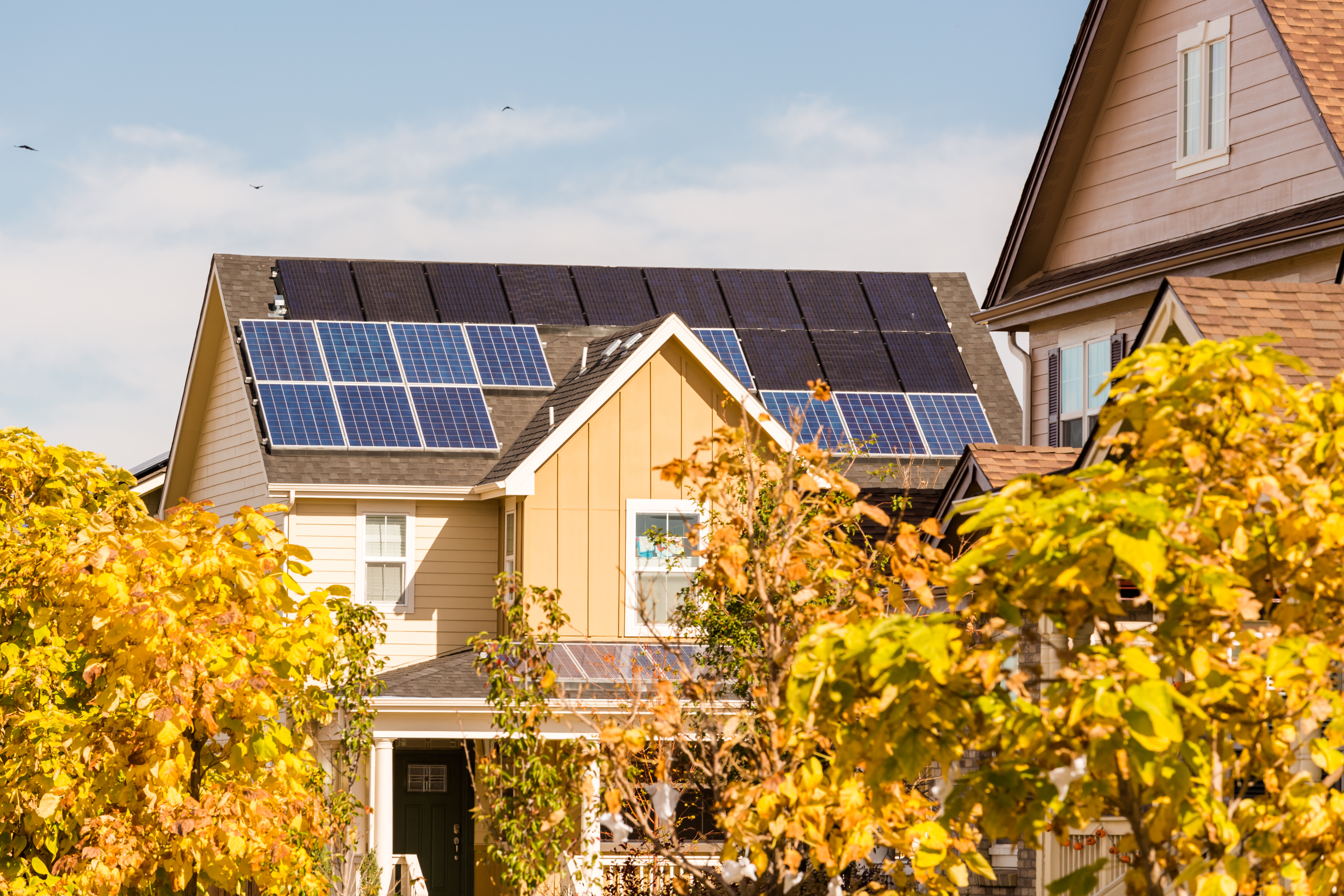 a house with solar panels on the roof